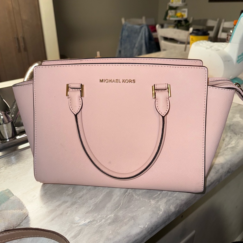Michael Kors Pink Satchel Bag with Structured Design